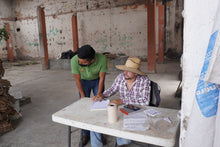 Daniel (left) Cristian (right) document incoming lots from La Yerba to finish drying at the Arrocera drying station